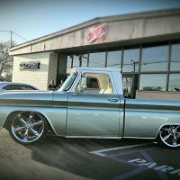 Vintage truck in parking lot stereo usa plus